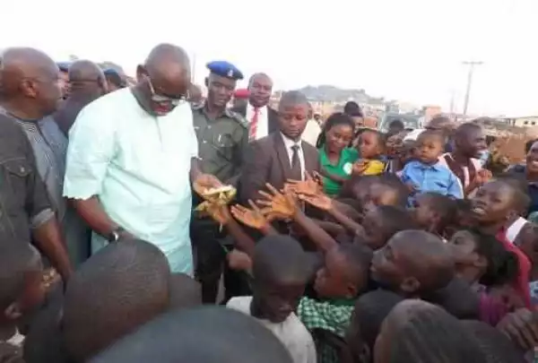 Fayose shares banana, groundnut to children in Ekiti (Photos)